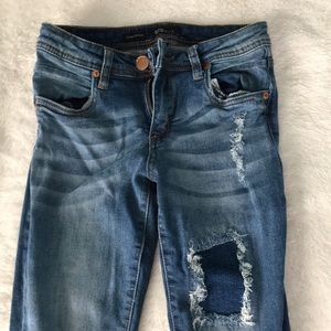 Distressed skinny jeans